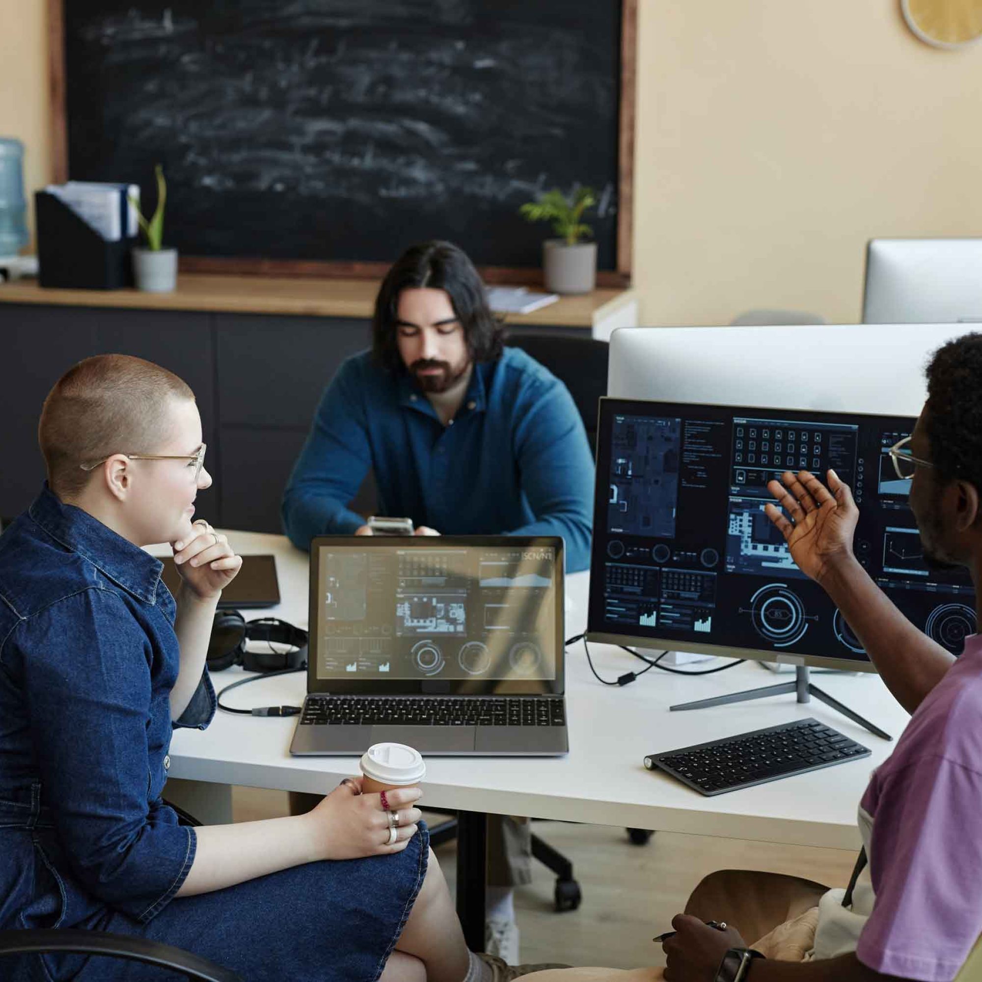 young-african-american-male-it-engineer-explaining-2025-03-09-18-26-36-utc.jpg